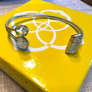 Kendra Scott bracelet. Clear stones on gold band.